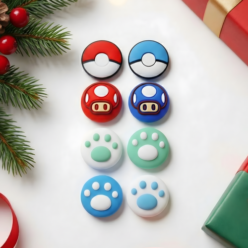 Colorful buttons with Christmas decorations on a white surface